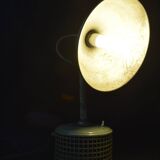 Industrial metal parabola lamp.