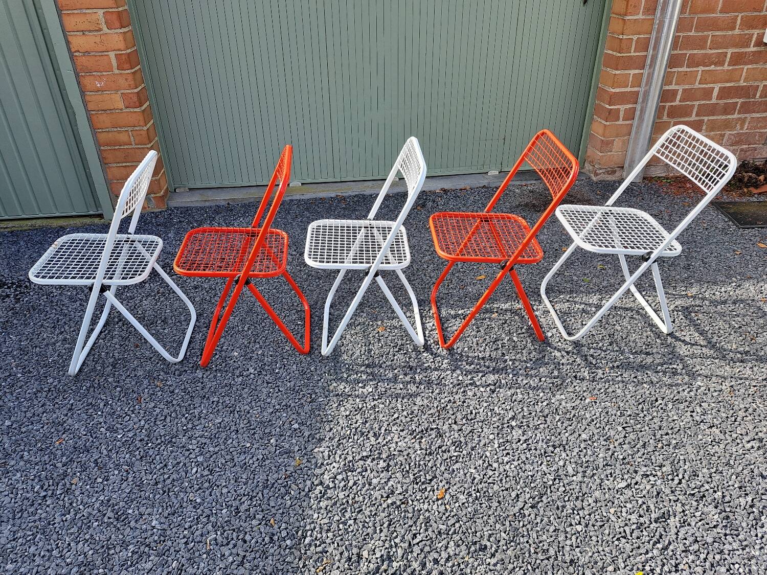 Series of 5 Talin folding metal chairs