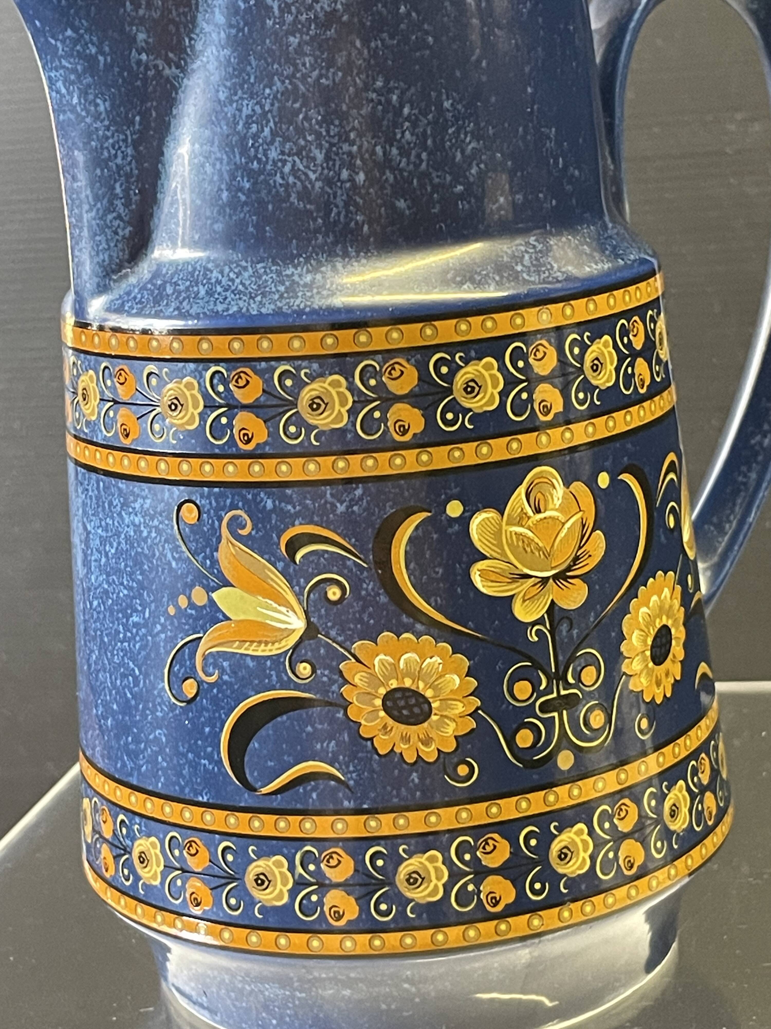Very nice blue ceramic jug in good condition.