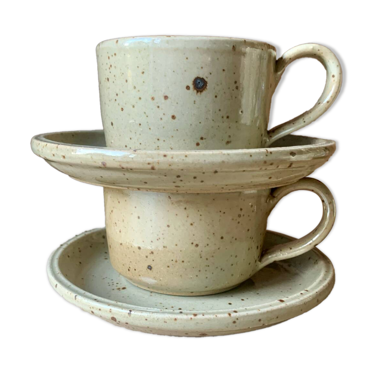 Two large Jean Austruy stoneware cups and saucers