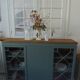 English sideboard, shallow, smoky green, wooden top.