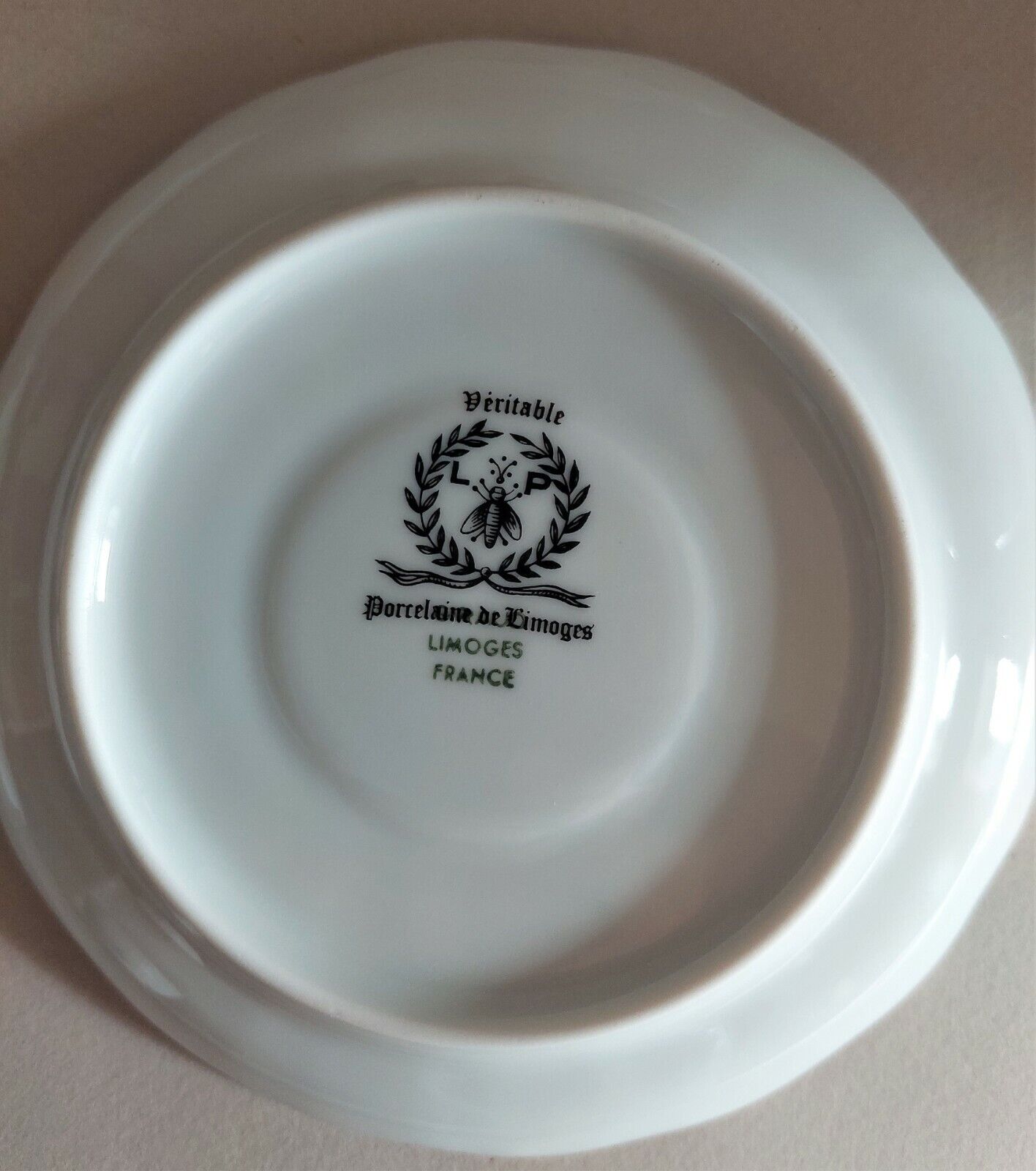 Tasses série de quatre porcelaine de Limoges Giraud