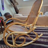Rocking chair in arched wood and cane