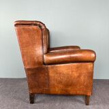 Vintage armchair in patinated sheep leather