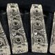 Set of 12 molded glass or crystal knife rests with diamond point decor