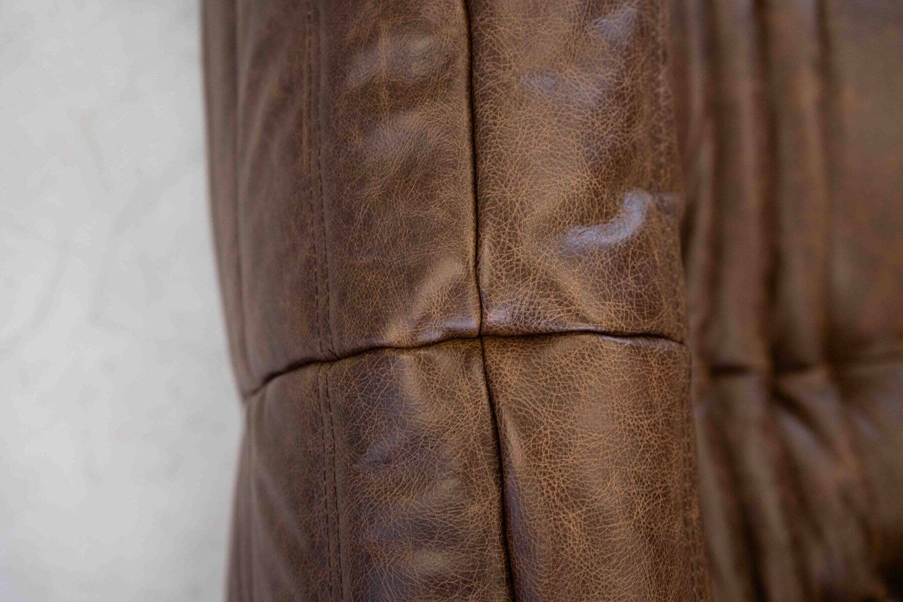 Vintage two-seater Togo sofa with arms in brown leather by Michel Ducaroy for Ligne Roset, 1970s