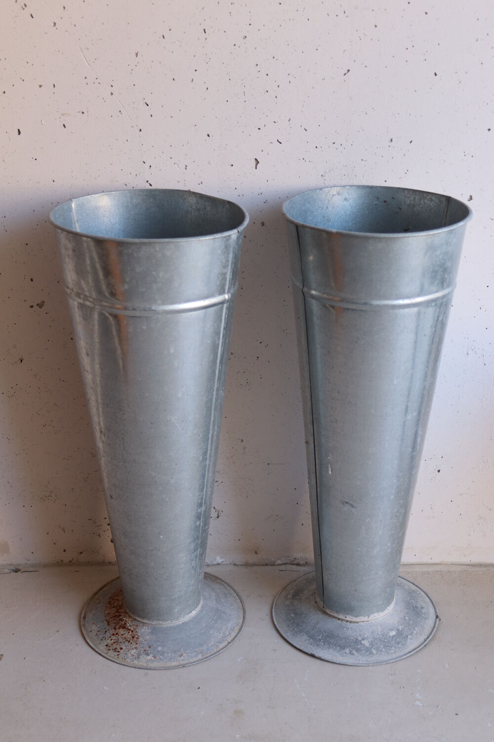 Pair of large zinc florist vases