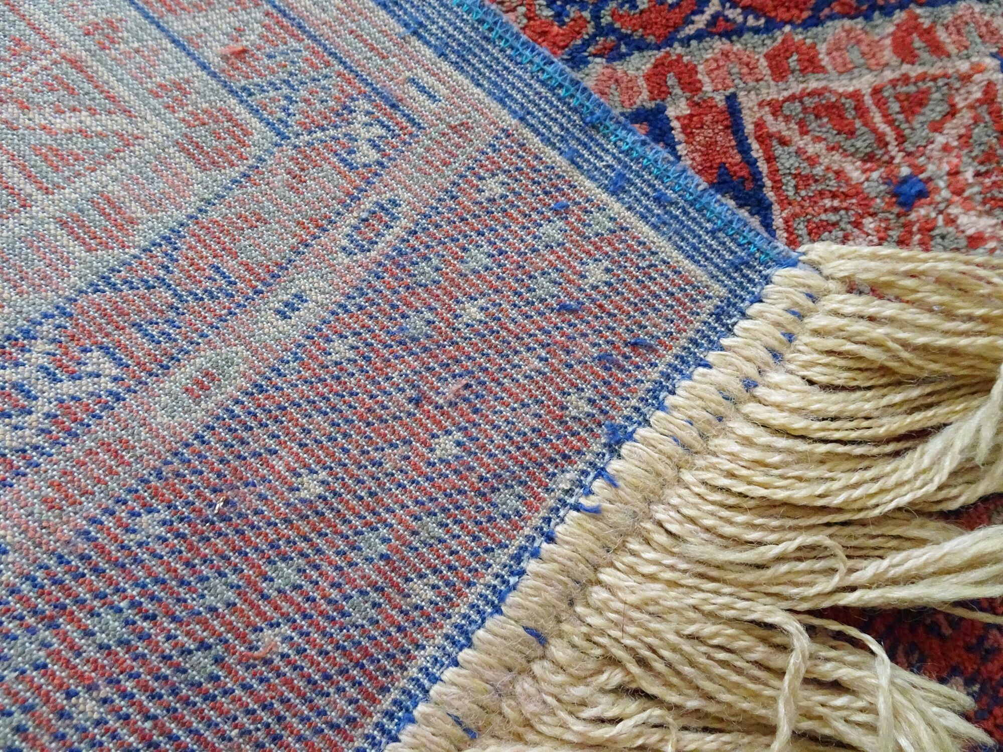 Orient carpet blue red with fringes