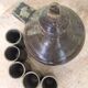 Old liquor service in sandstone, carafe and 5 glasses