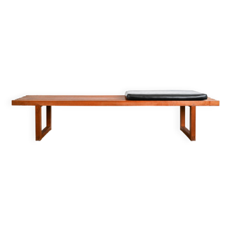Teak bench with black leatherette seat cushion Origin Denmark years