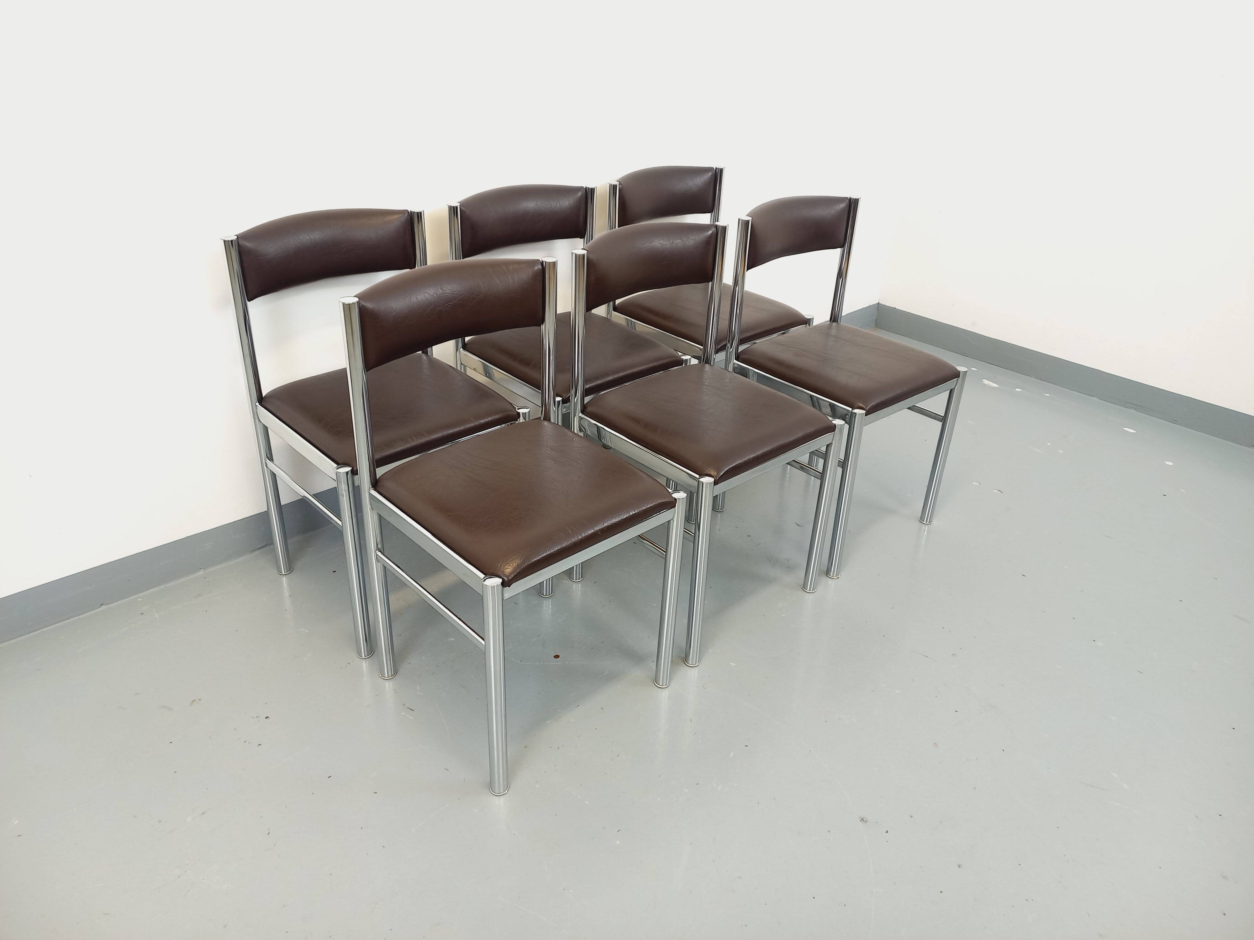 Set of 6 vintage chairs from the 70s in chrome metal and brown faux leather.