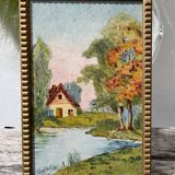 Small landscape painting with golden frame