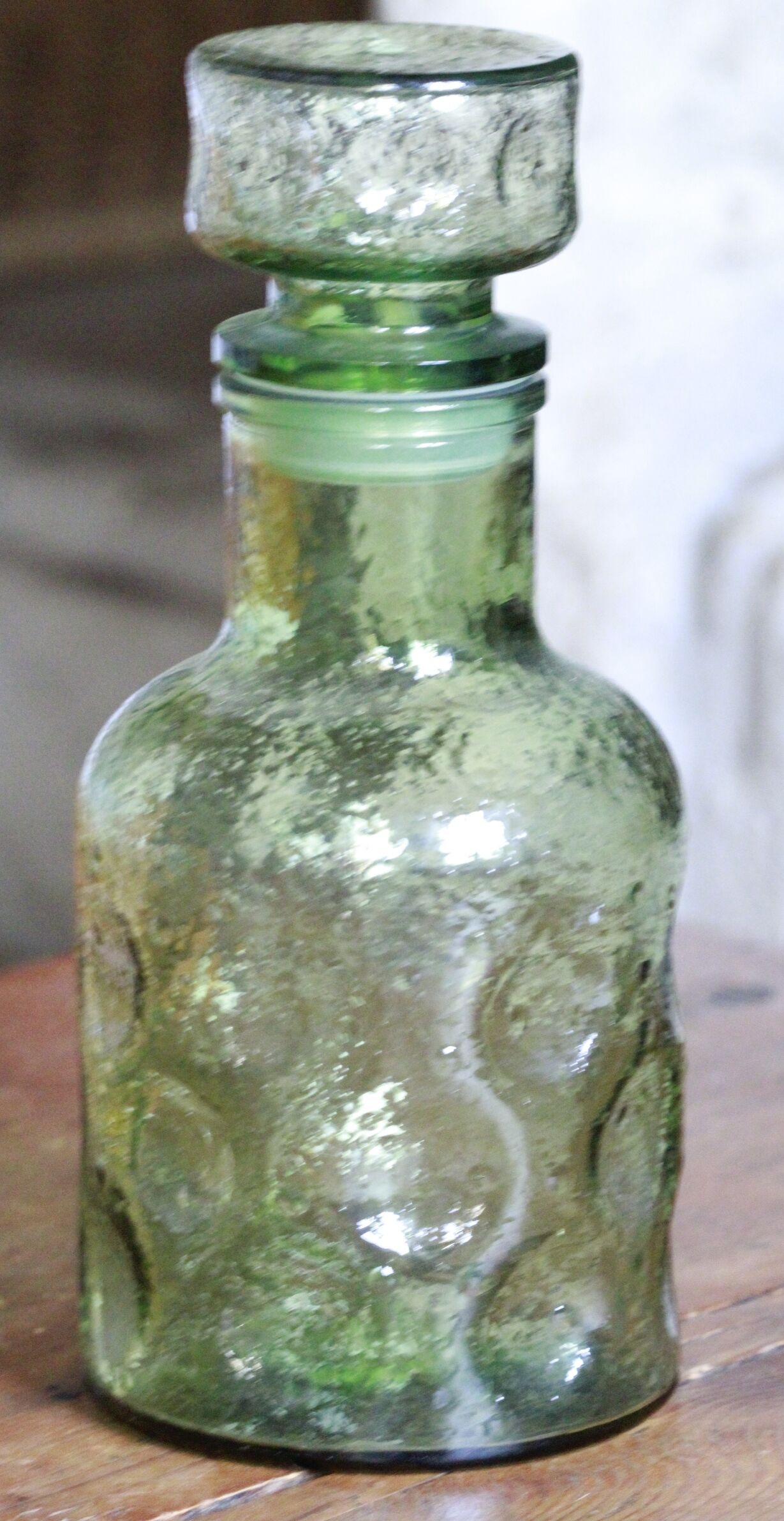 Green bottle made of old glass
