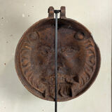 Three cast-iron and terracotta façade decoration lions, around 1880.