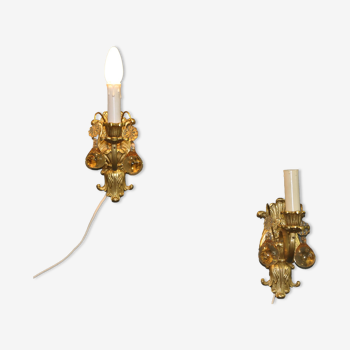 Pair of Orrefors brass wall lamps