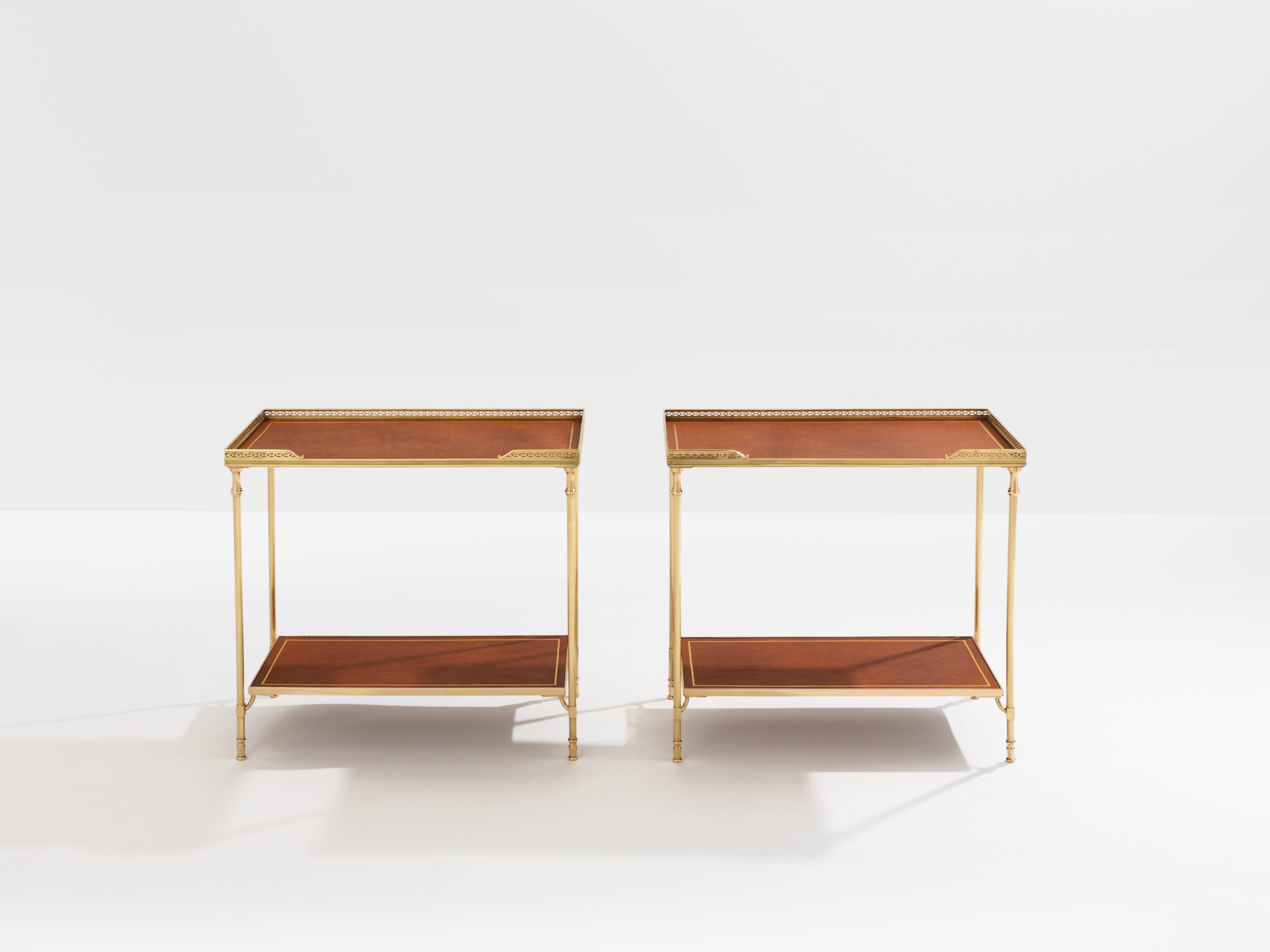 Pair of neoclassical brass and leather side tables by Maison Jansen, 1960