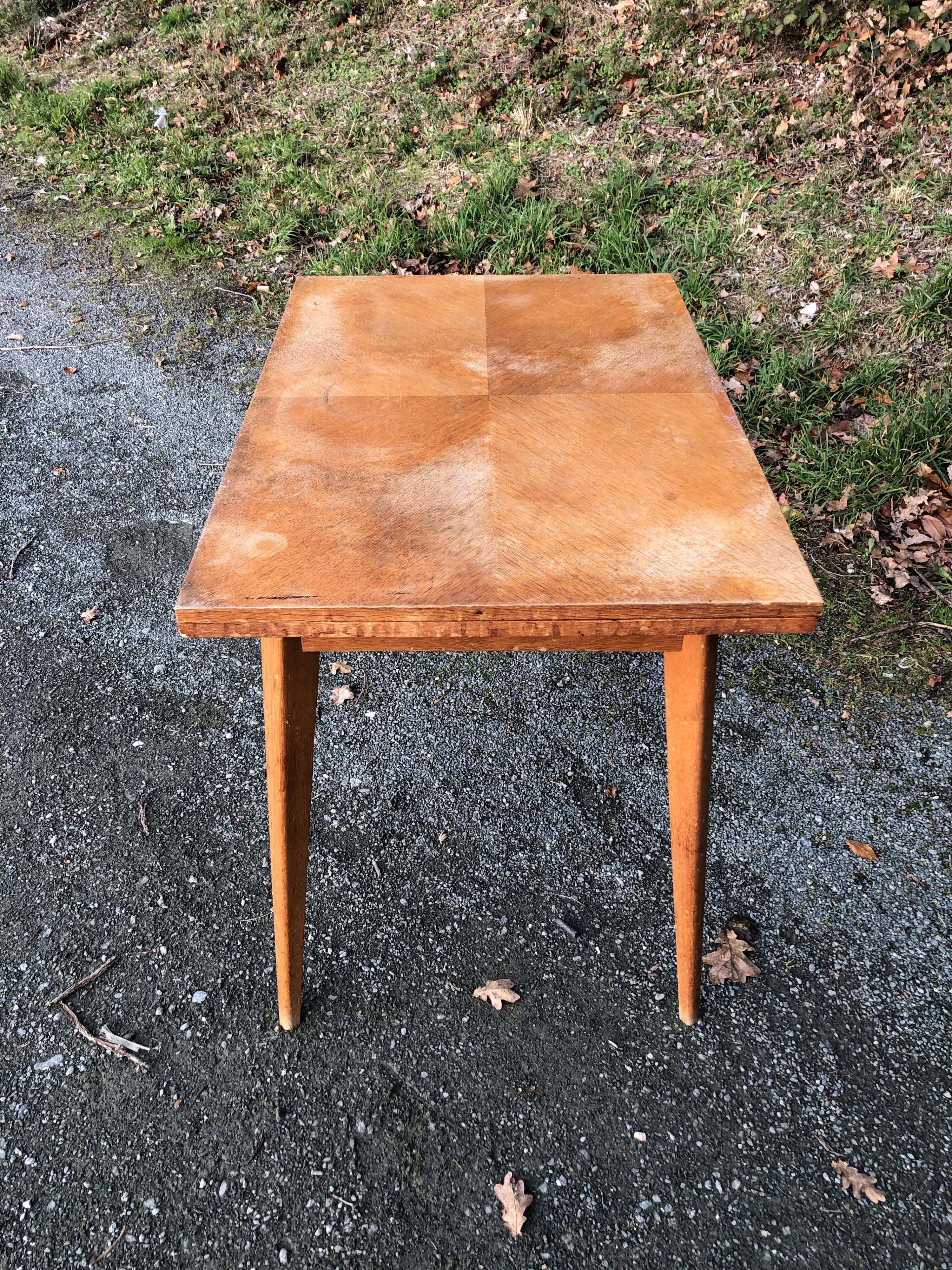 Vintage so-called portfolio table with oak compass base and its oak cp swivel top.