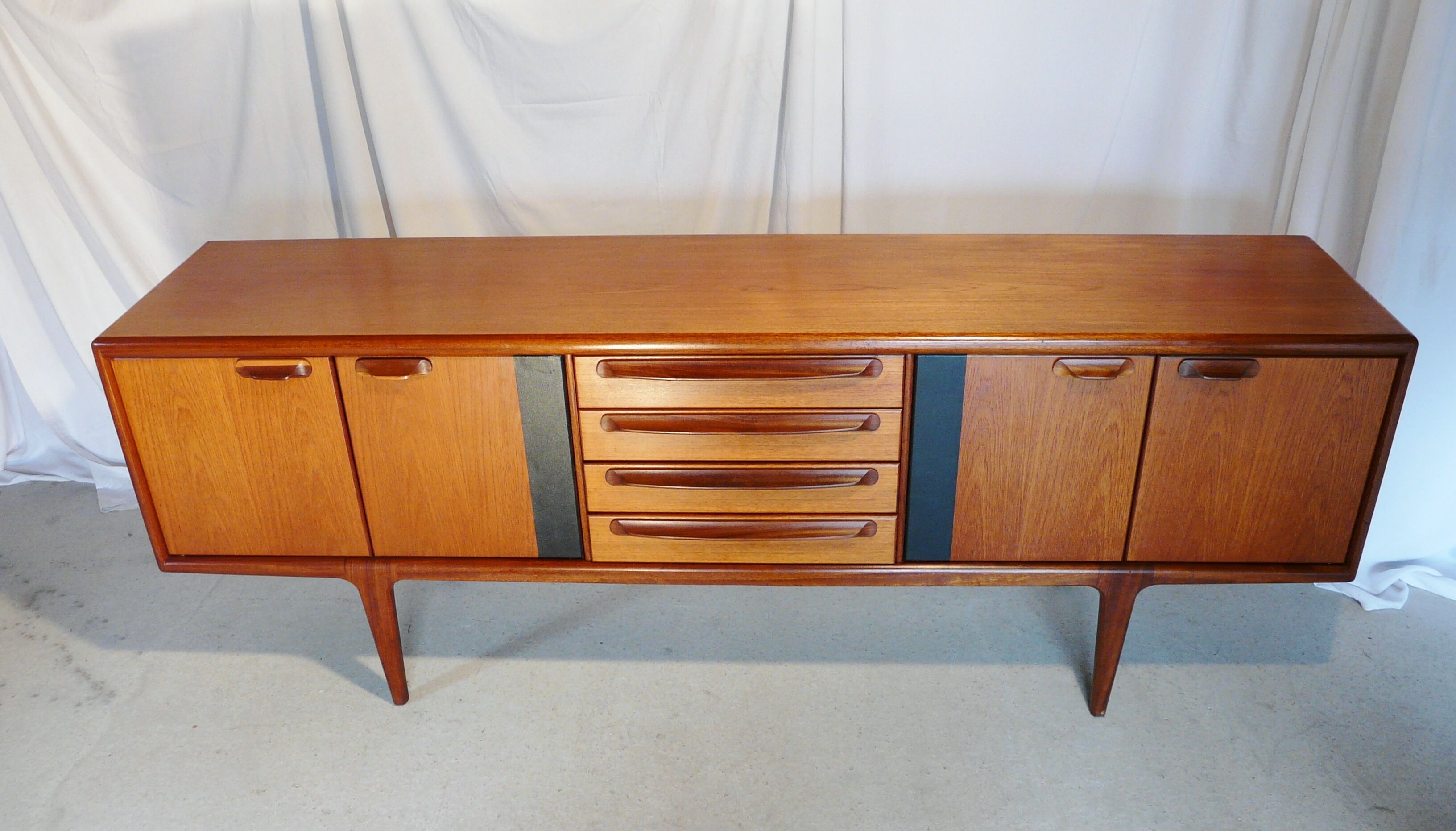 Younger Scandinavian teak strand