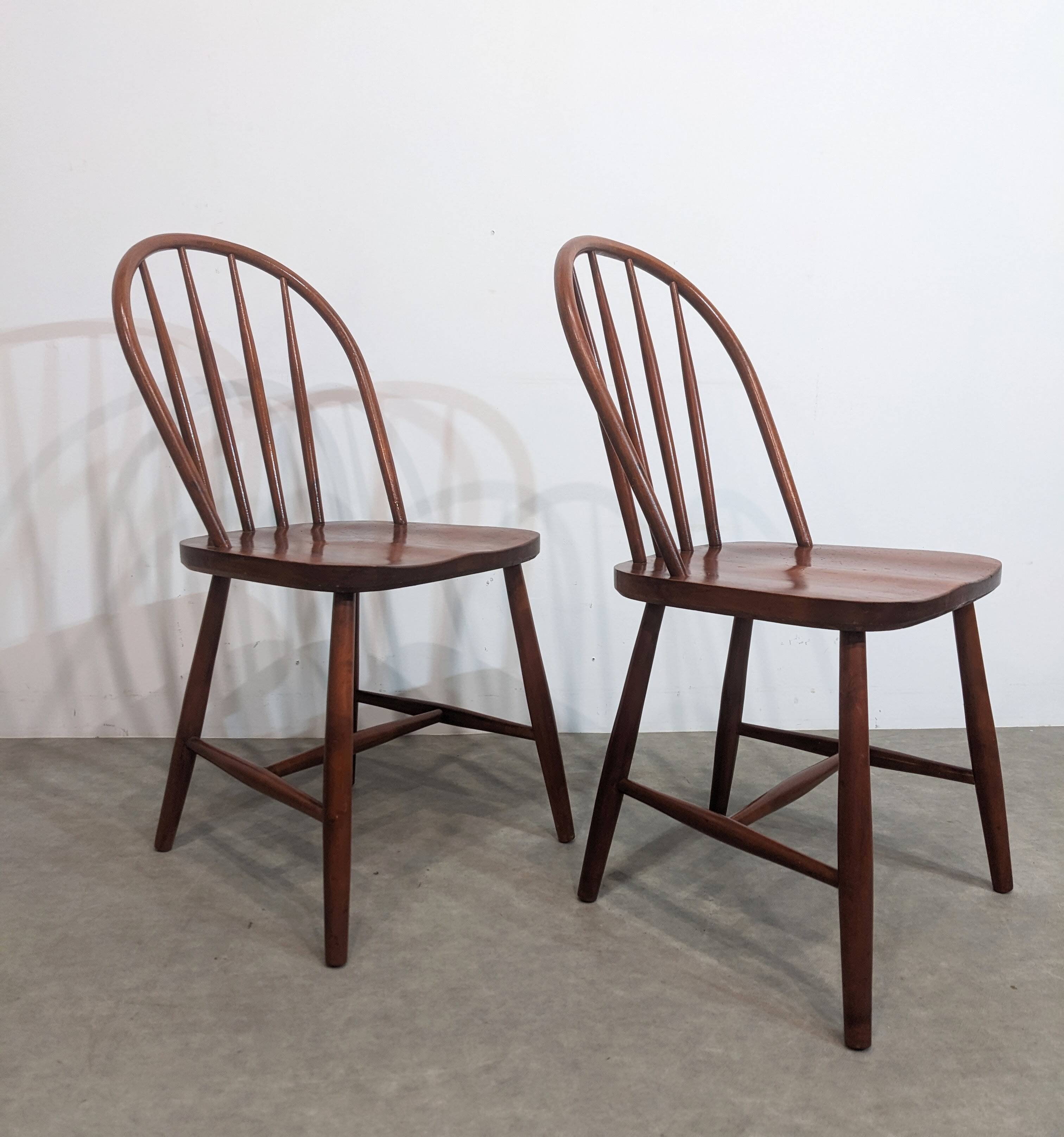 Pair of chairs with rounded backs, mid-20th century