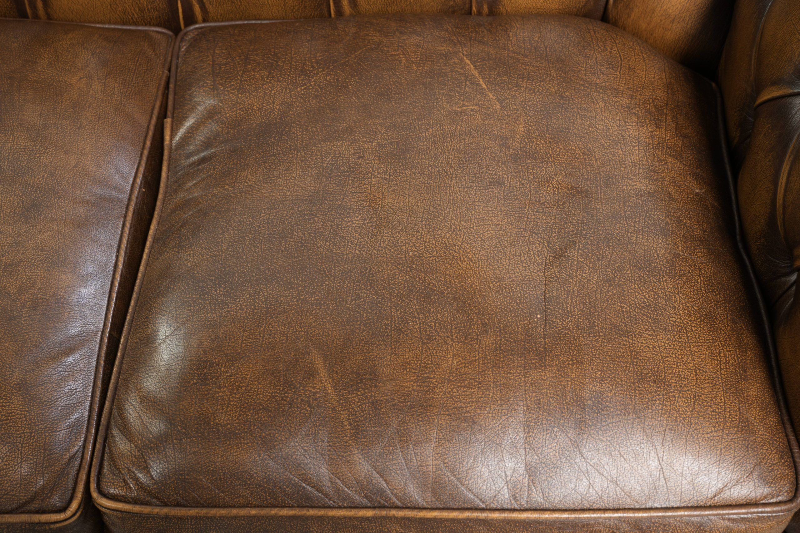 English cowhide leather Chesterfield 2-seater sofa in a luxurious colour