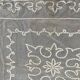 Old tablecloth embroidered with openwork embroidery.