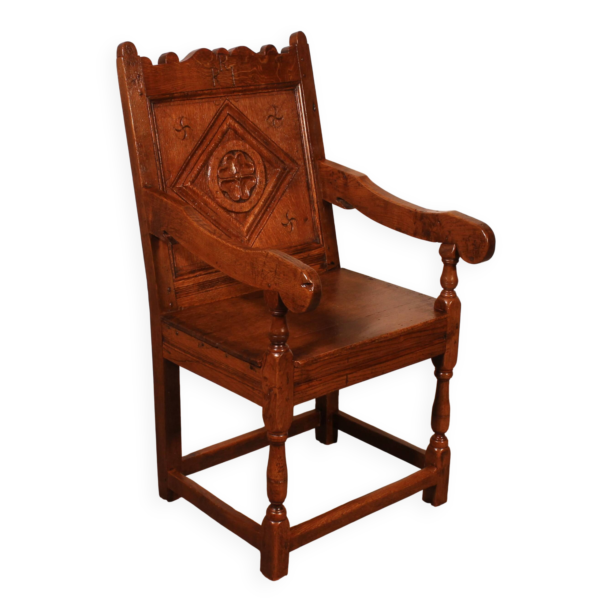 high-backed armchair from the 17th century in oak