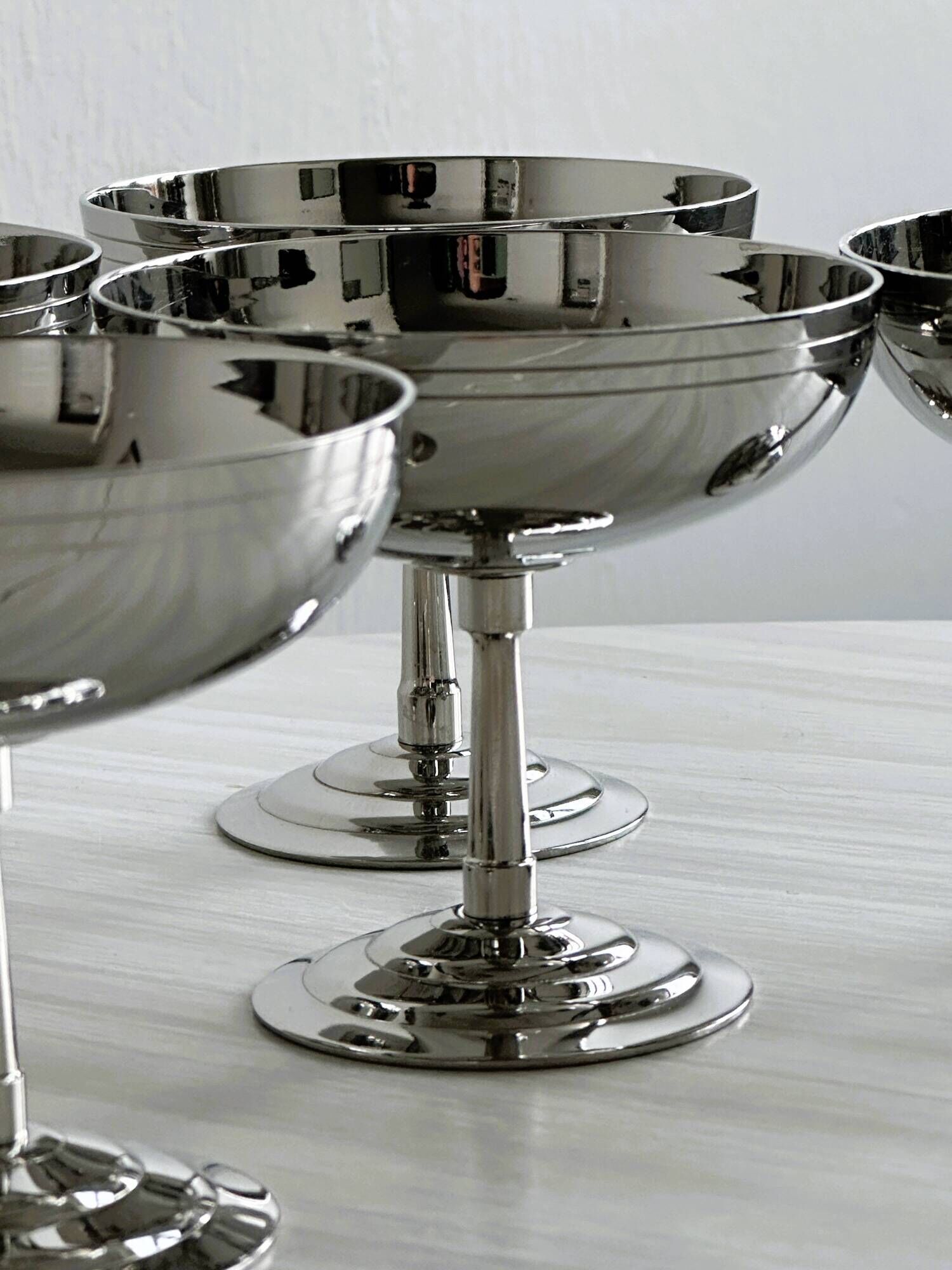6 Letang Remy stainless steel standing cups, made in France.