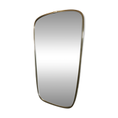 Vintage 1960s mirror in the shape of a so-called rear-view mirror with a gold metal trim.