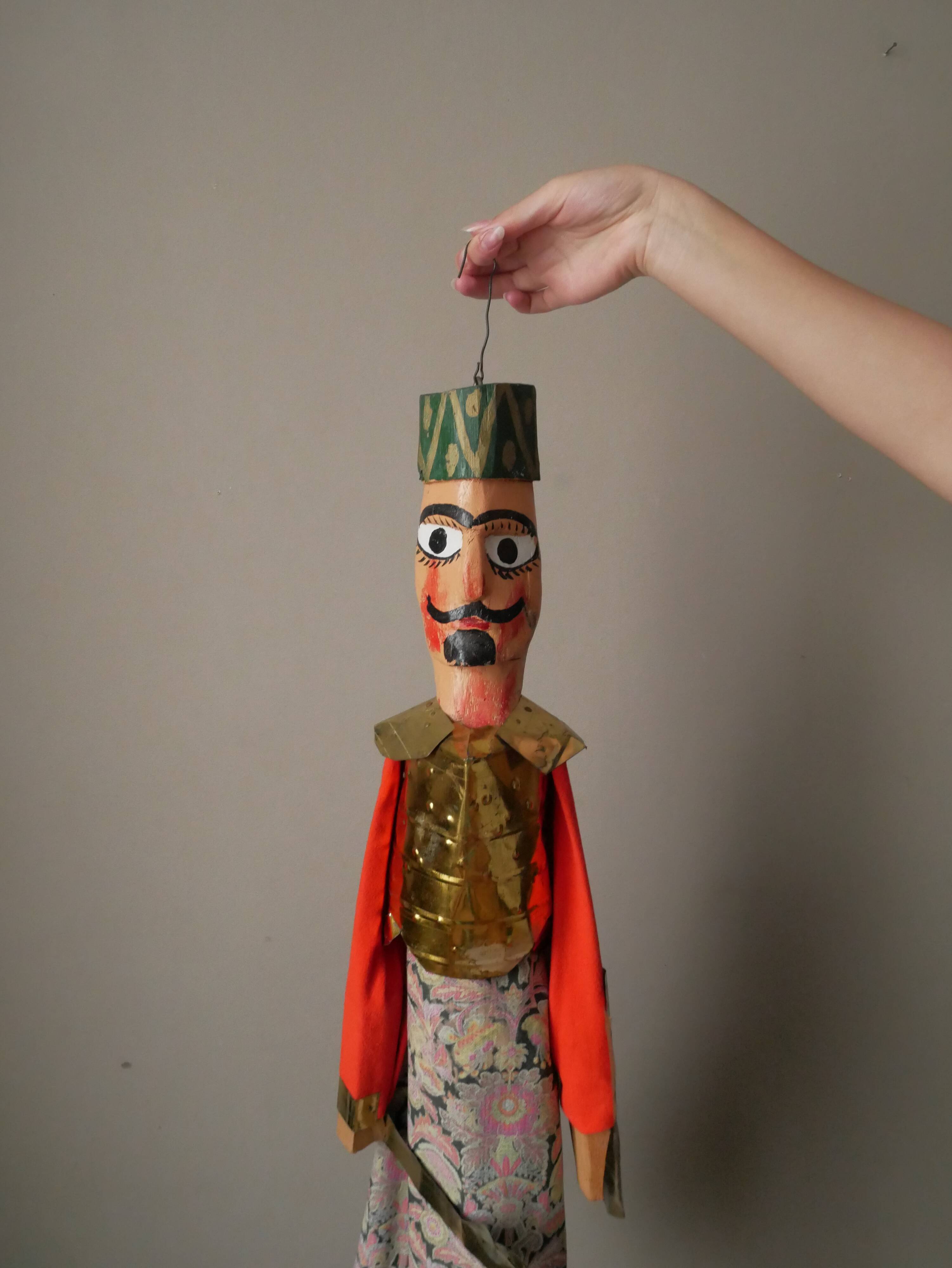 Old Turkish decorative puppet in wood and gilded metal, old toy, handcrafted