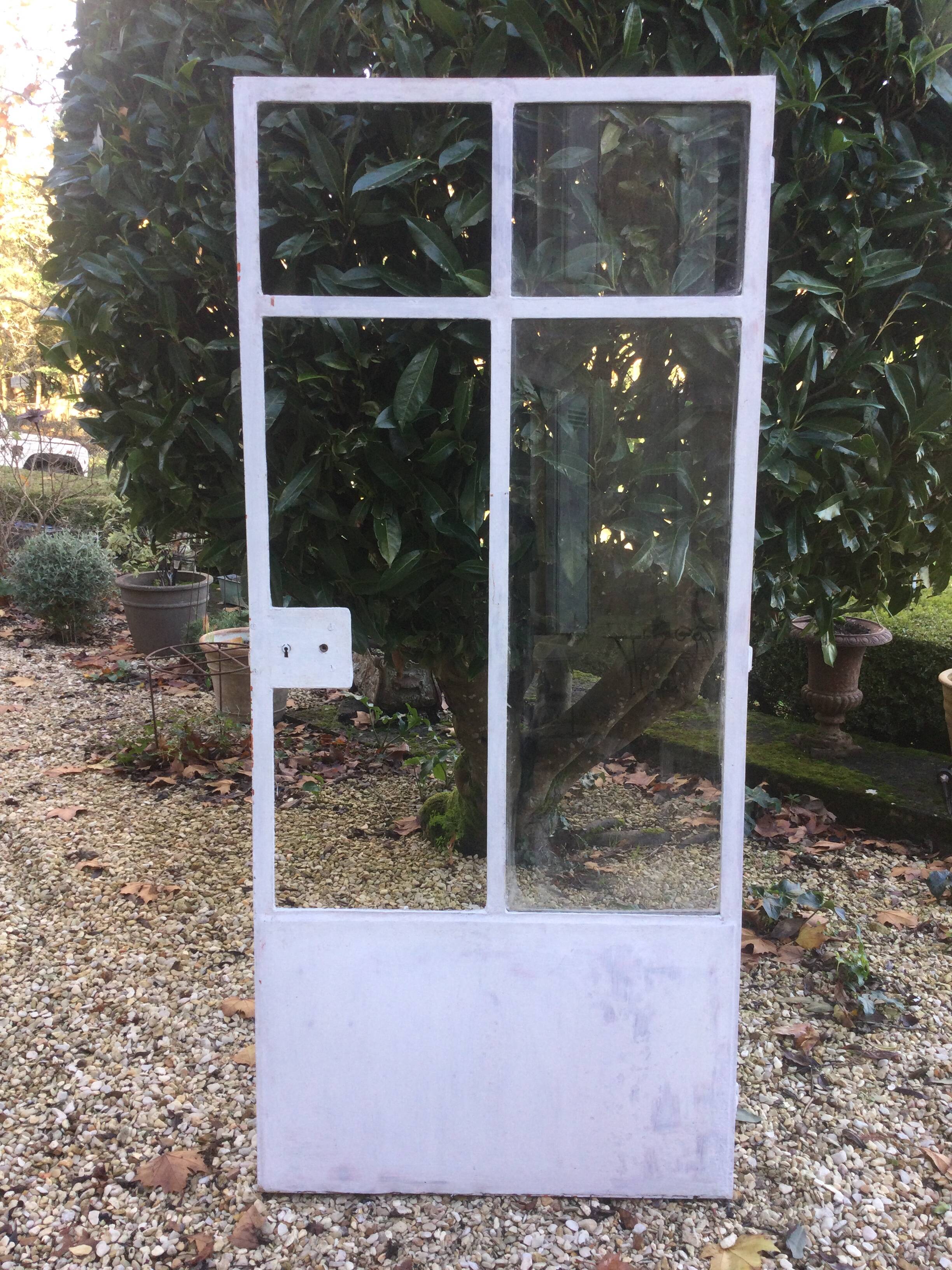 Old glass roof with door and window