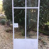 Old glass roof with door and window