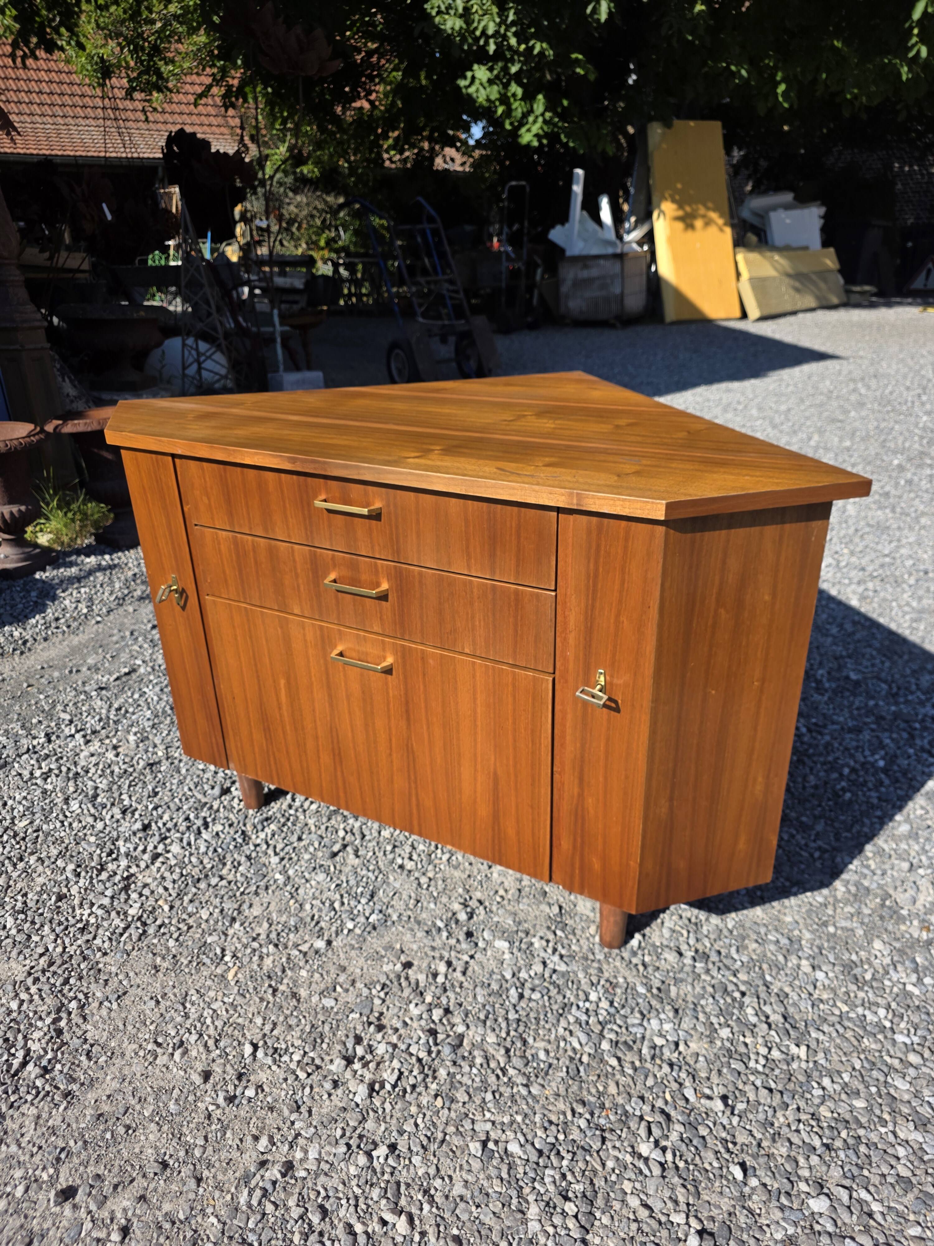 Scandinavian corner unit in teak from the 1960s.
