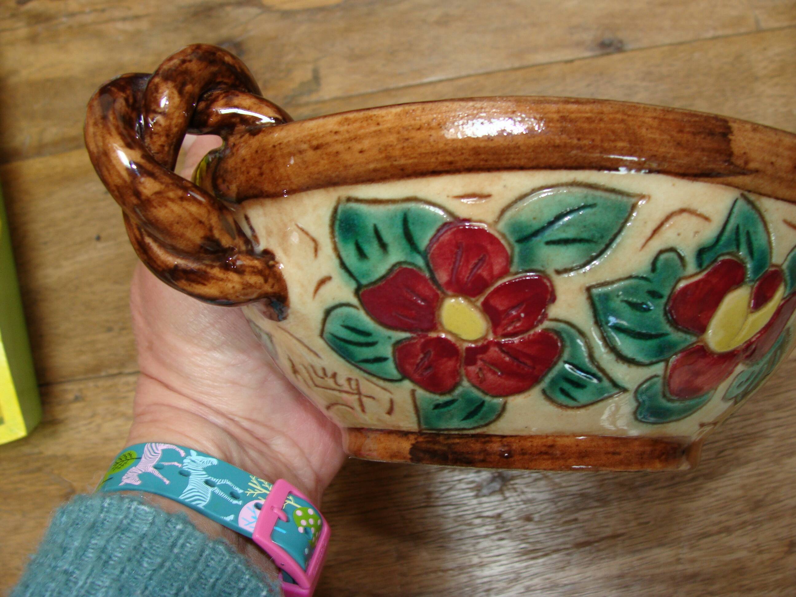 Antique engraved and enamelled ceramic cup