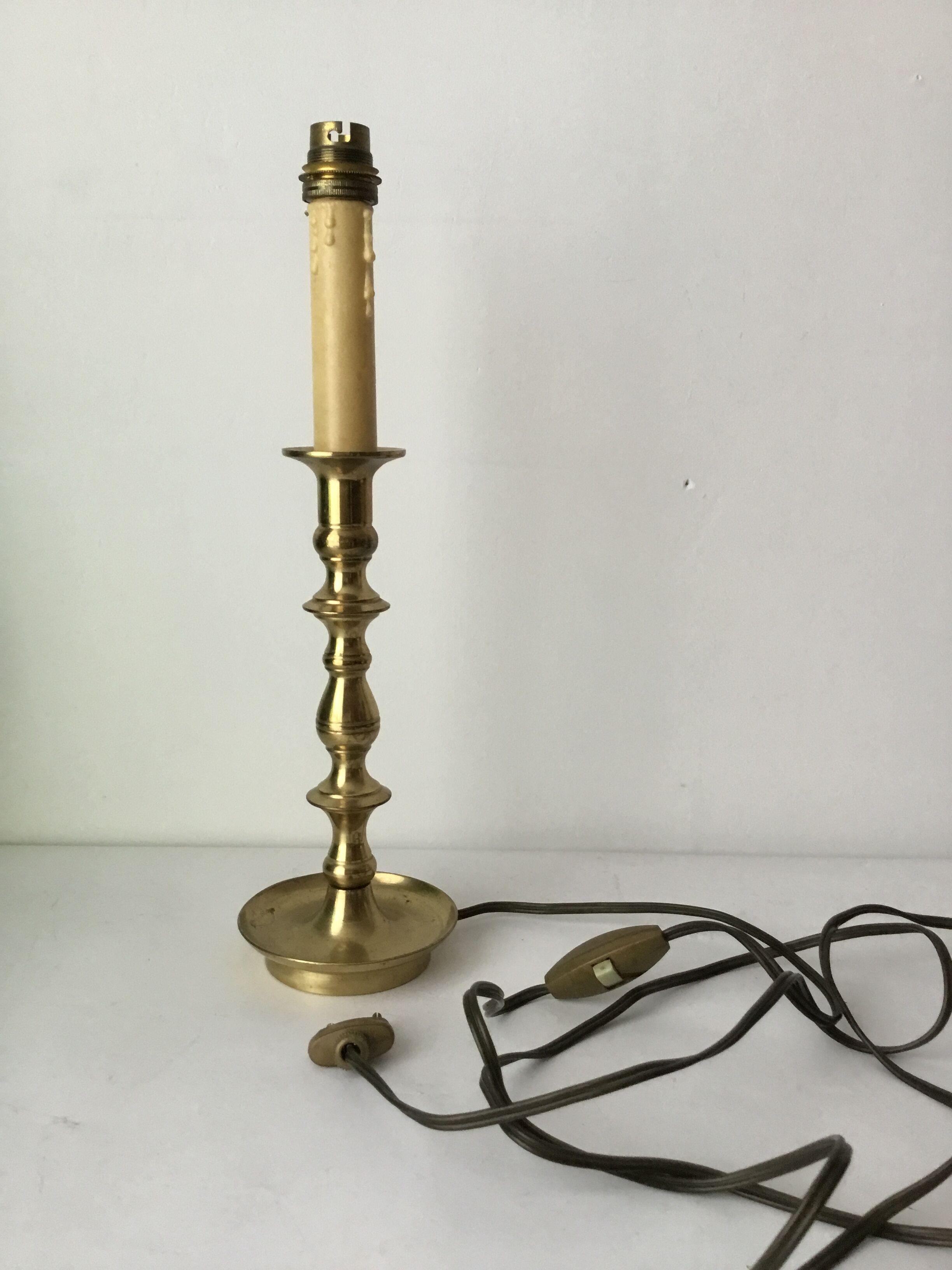 Brass candle-shaped lamp