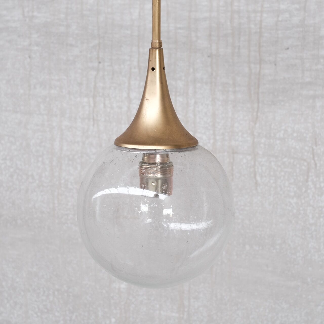 German mid-century clear glass and brass pendant