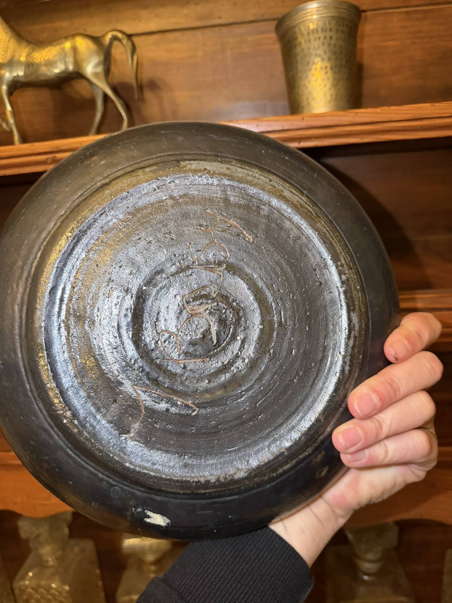 Stoneware plate signed J. Brisy
