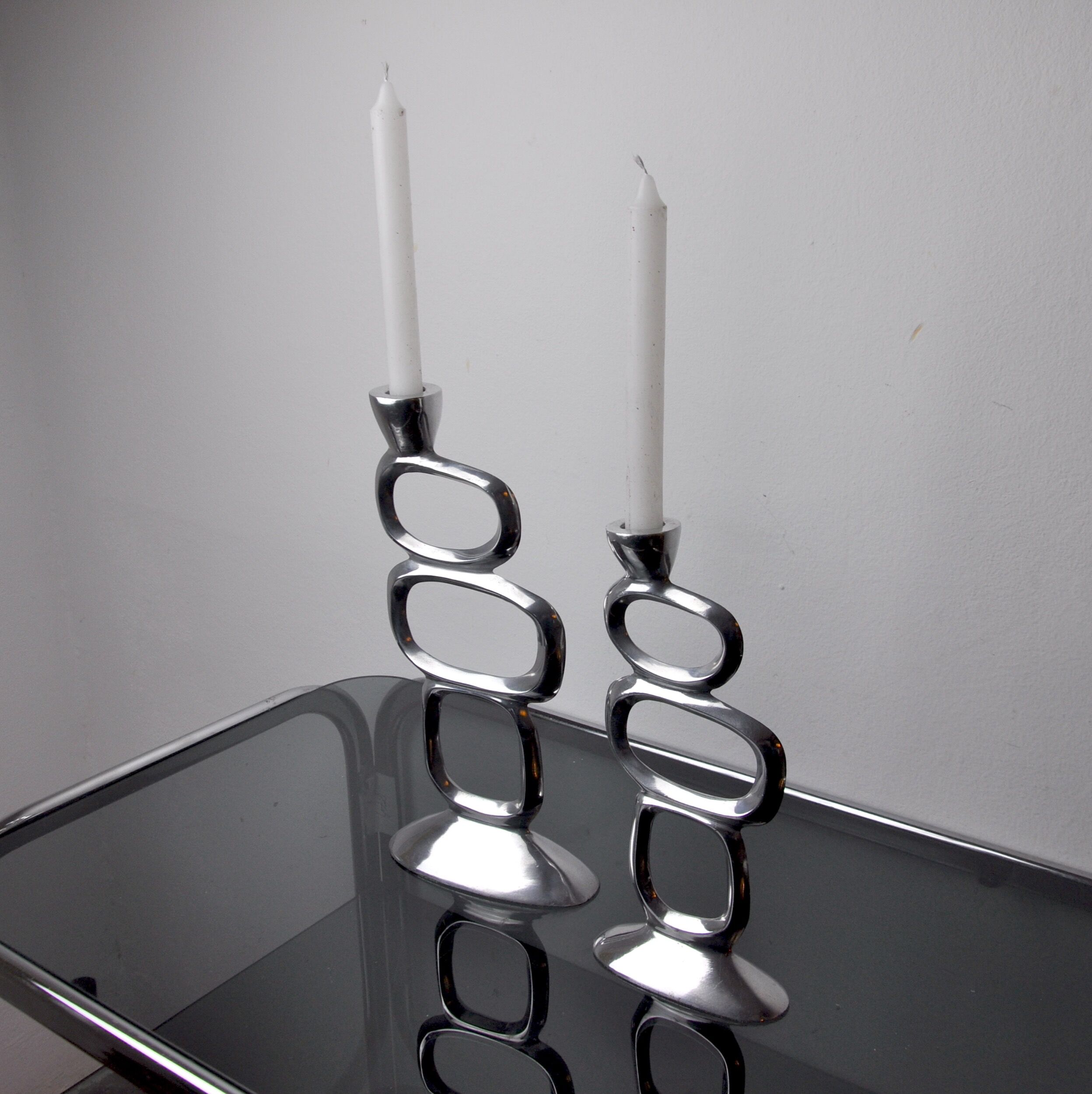 Pair of circle candlesticks by Matthew Hilton, England, 1980