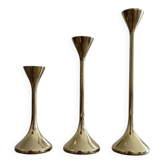 Set of 3 Scandinavian brass candle holders with tulip base from the 1970s.