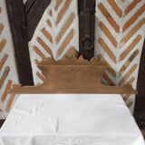 Old sandblasted wooden pediment