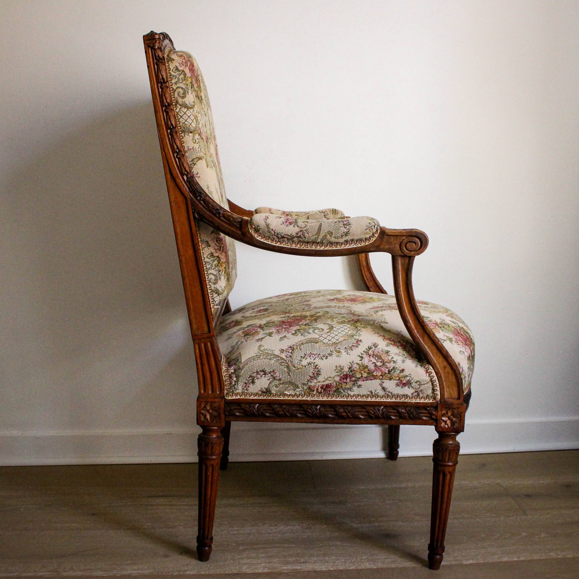 Louis XVI style carved armchair
