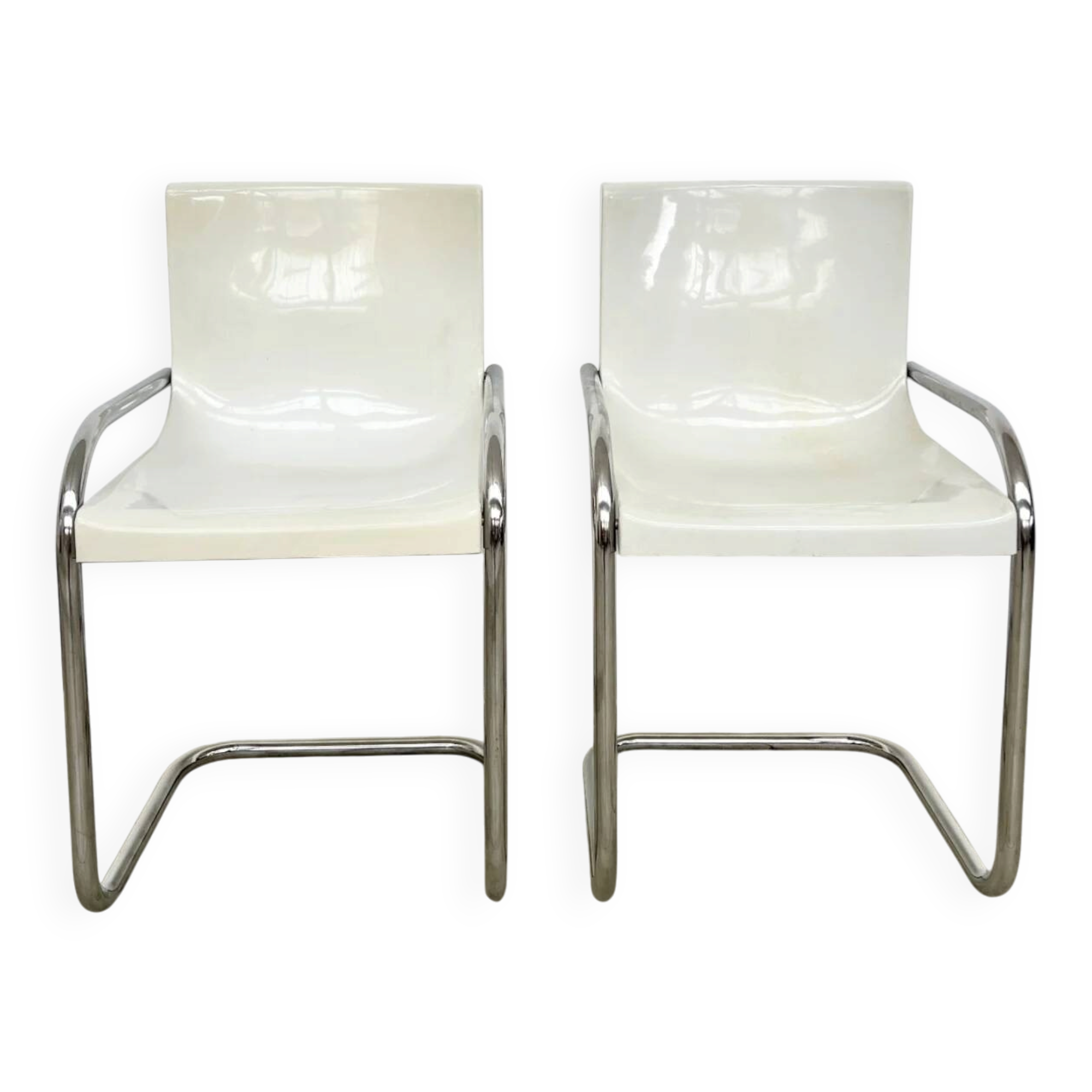 Pair of white moulded shell chairs with chrome tube — Space Age 70s