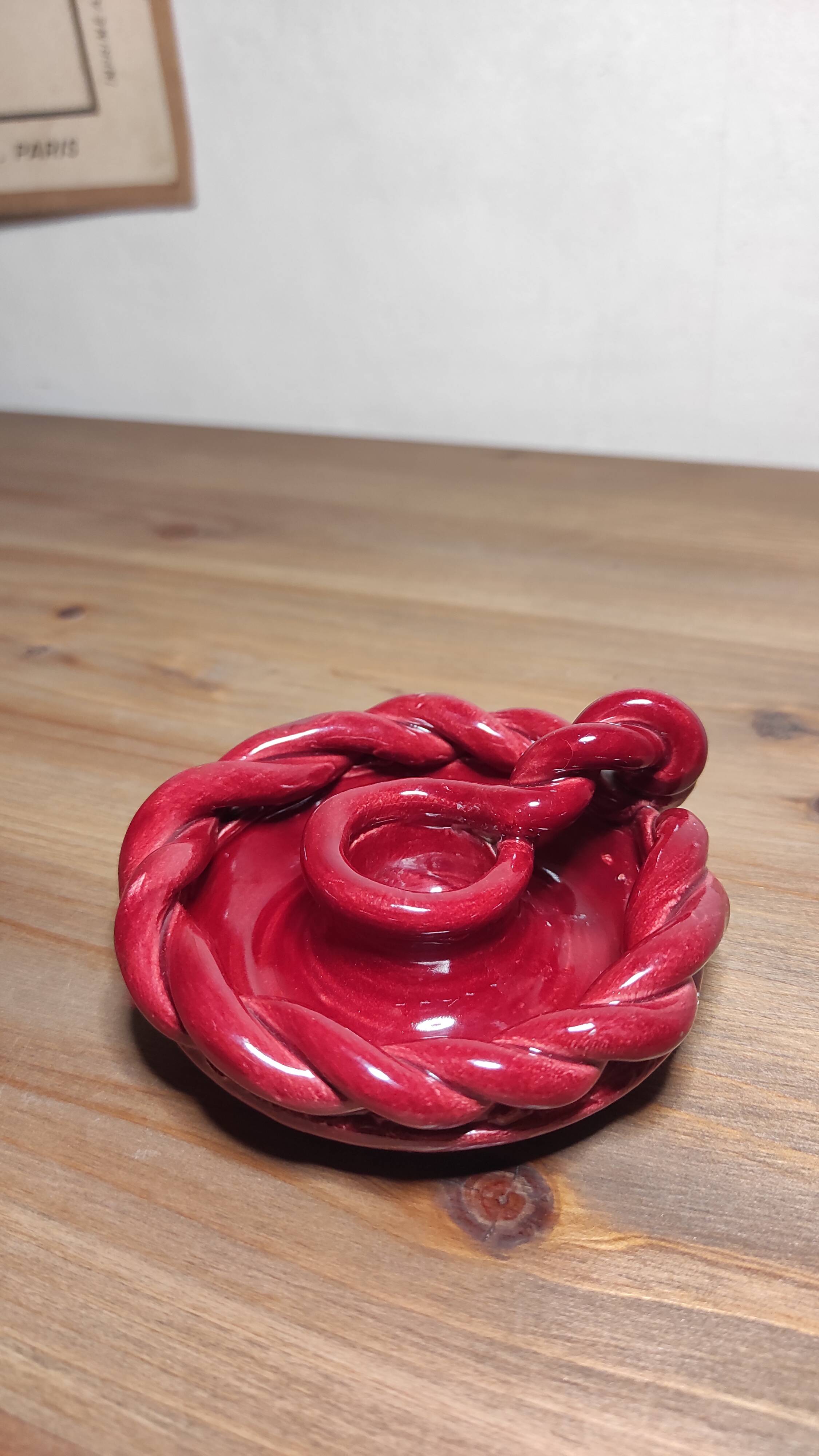 Twisted red earthenware candle holder