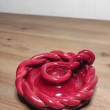 Twisted red earthenware candle holder
