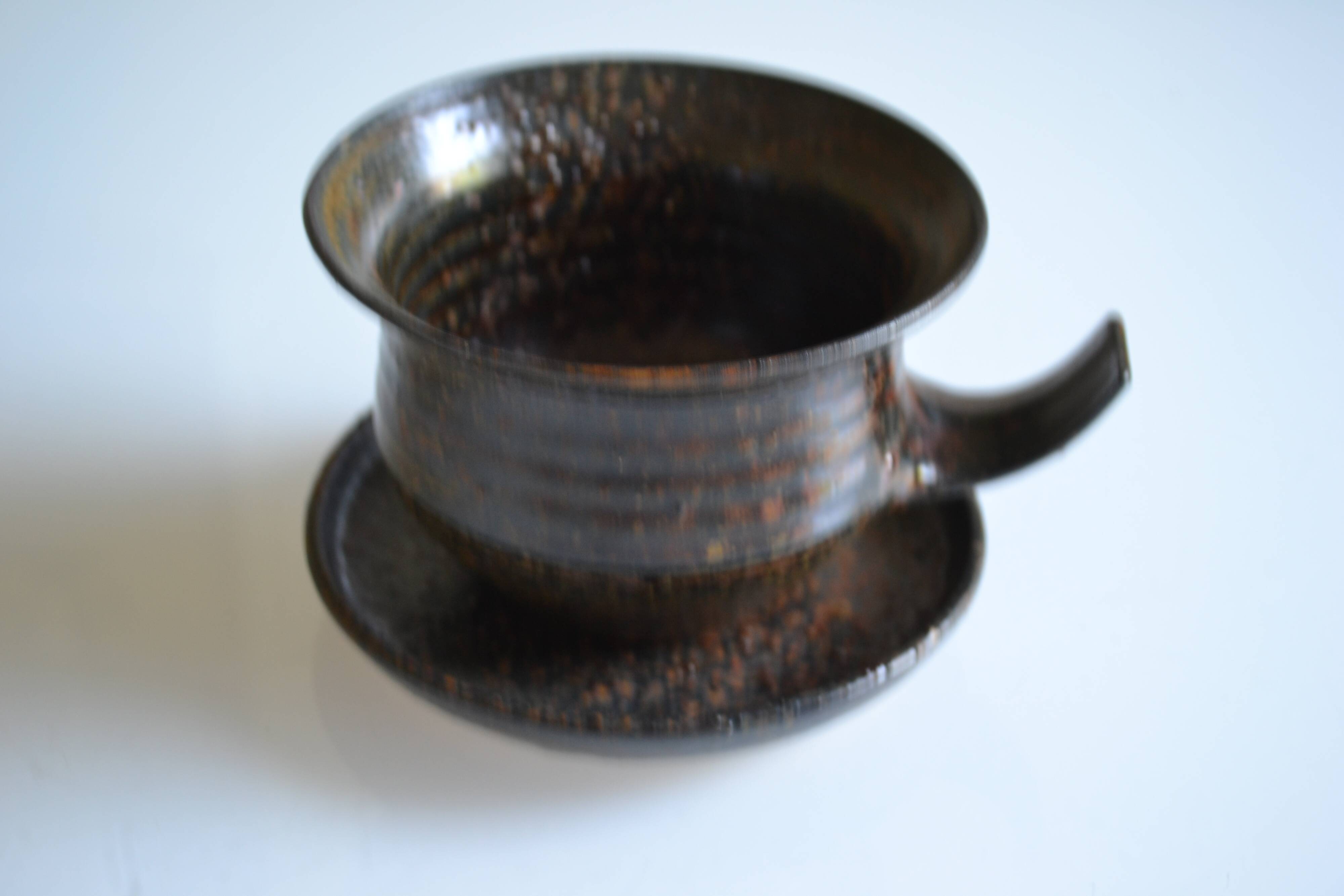 1970s ceramic cup and saucer signed