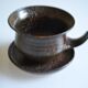 1970s ceramic cup and saucer signed