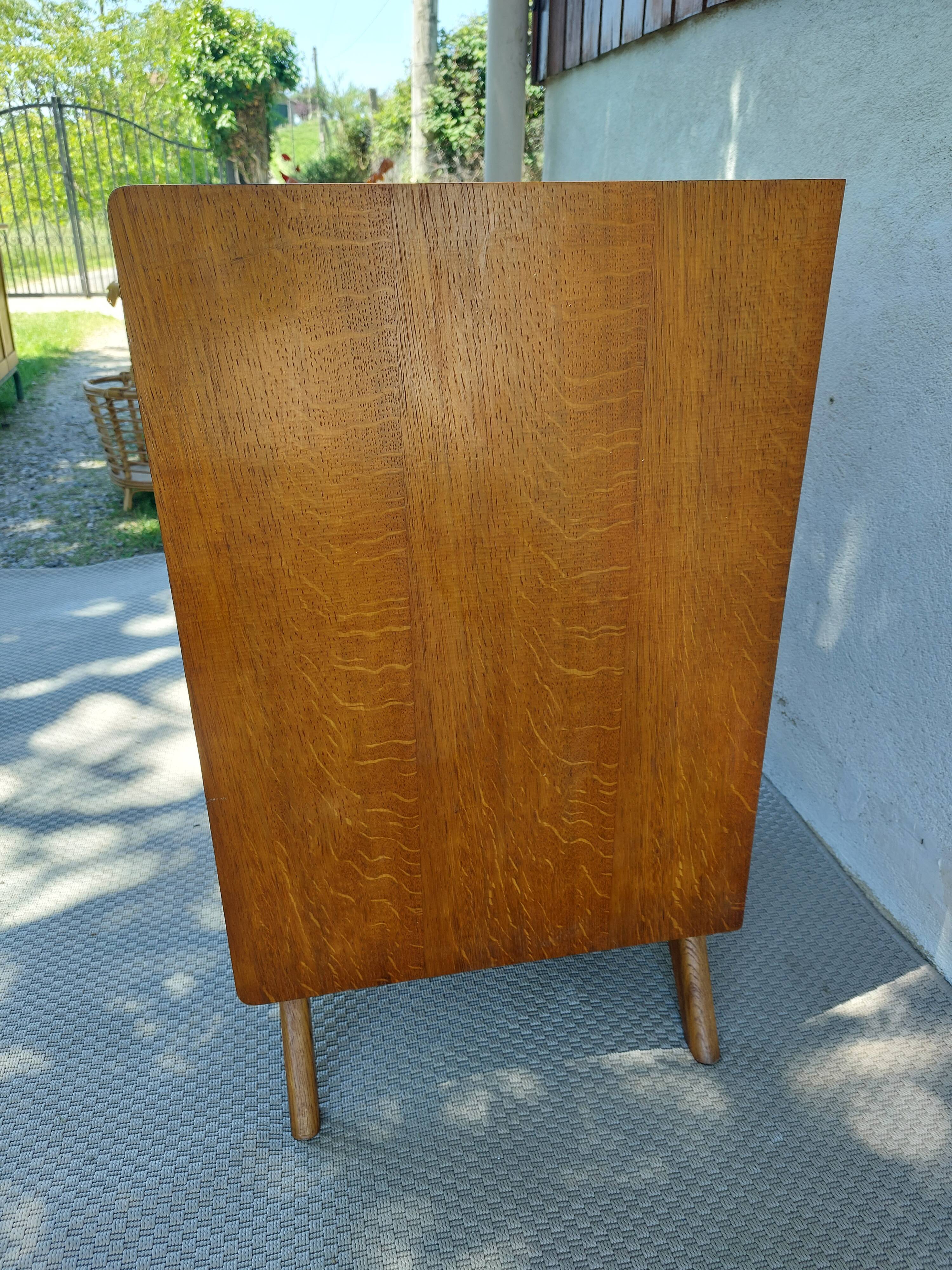Commode vintage pieds compas en bois massif et osier