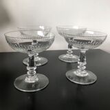 4 glasses of carved crystal champagne