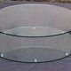 Coffee table with rotating glass tops by Antoine Motard.
