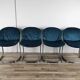 Four 1970s tubular chairs upholstered in blue velvet