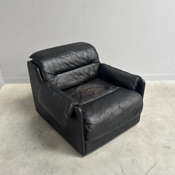 Black leather lounge chair by Dreipunkt, 1970s